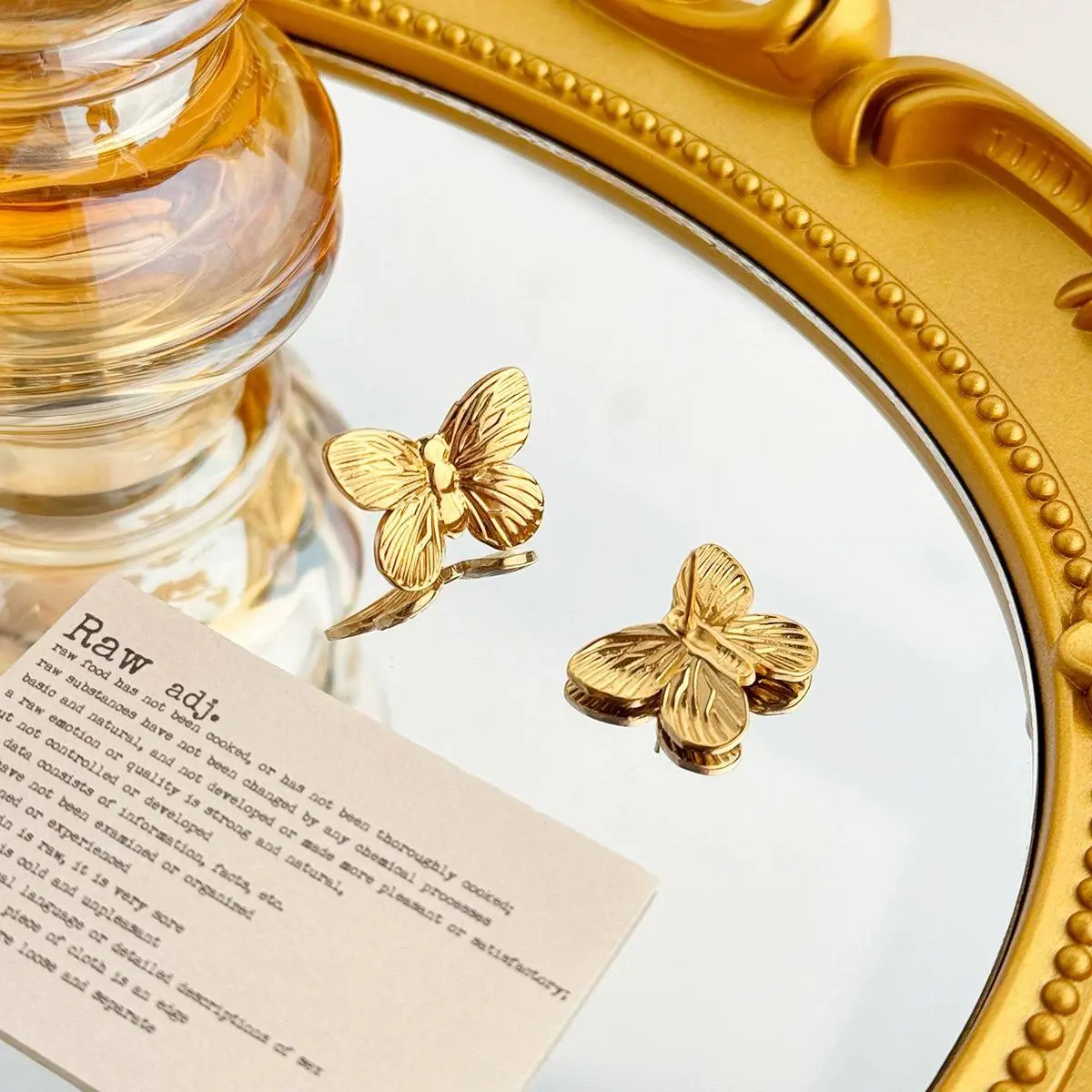 Gold Earrings in the Shape of a Butterfly