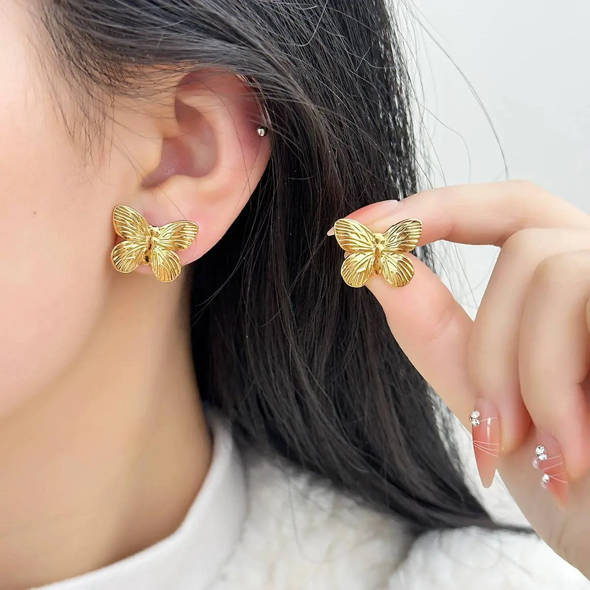 Gold Earrings in the Shape of a Butterfly - Image 4