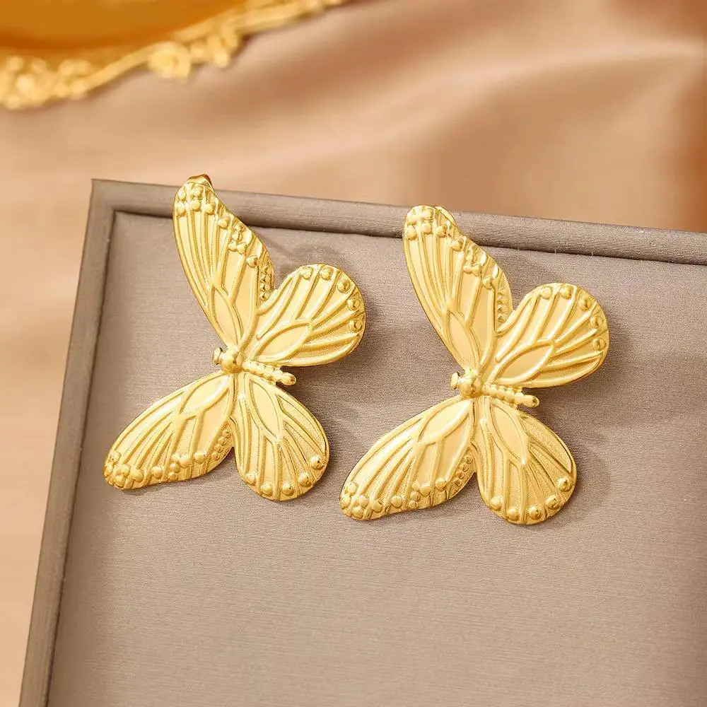 Gold Earrings in the Shape of a Butterfly - Image 3
