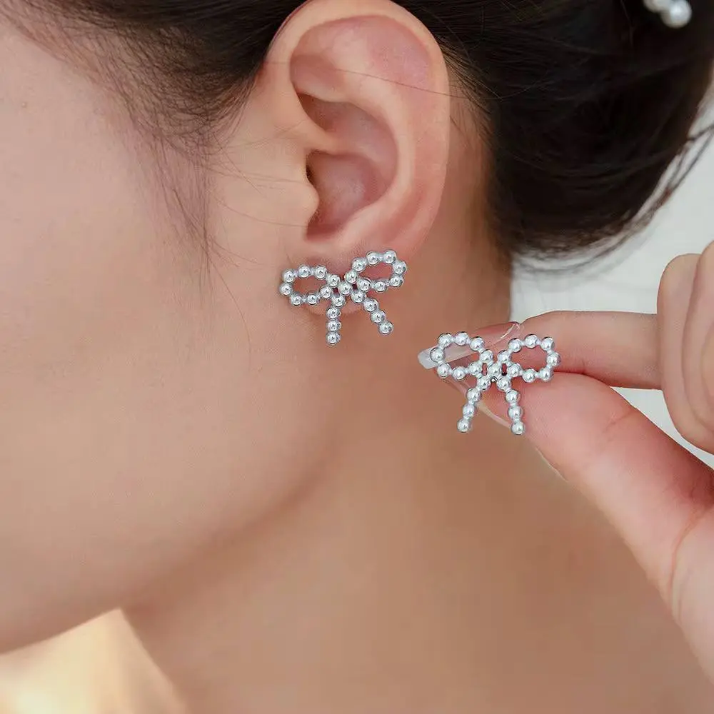 Silver Earrings in the Shape of a Bow