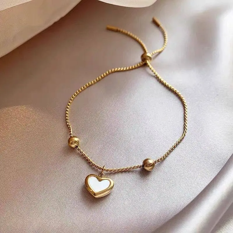 Gold Plated Adjustable Bolo Bracelet with Mother-of-Pearl Heart Charm